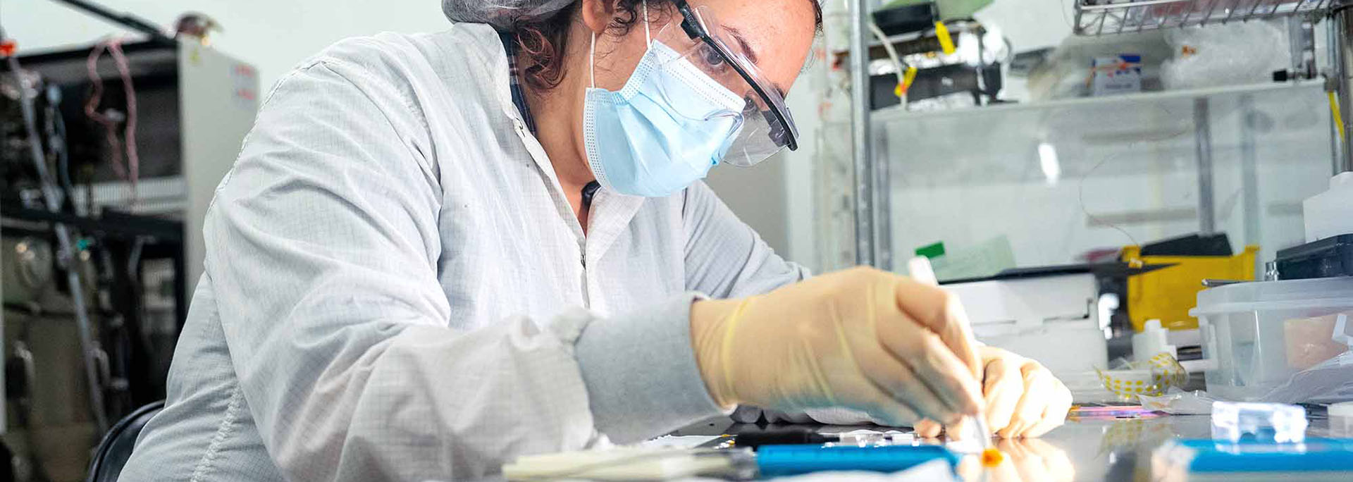 A researcher works with semiconductor materials at Arizona State University’s MacroTechnology Works in Tempe, Arizona.